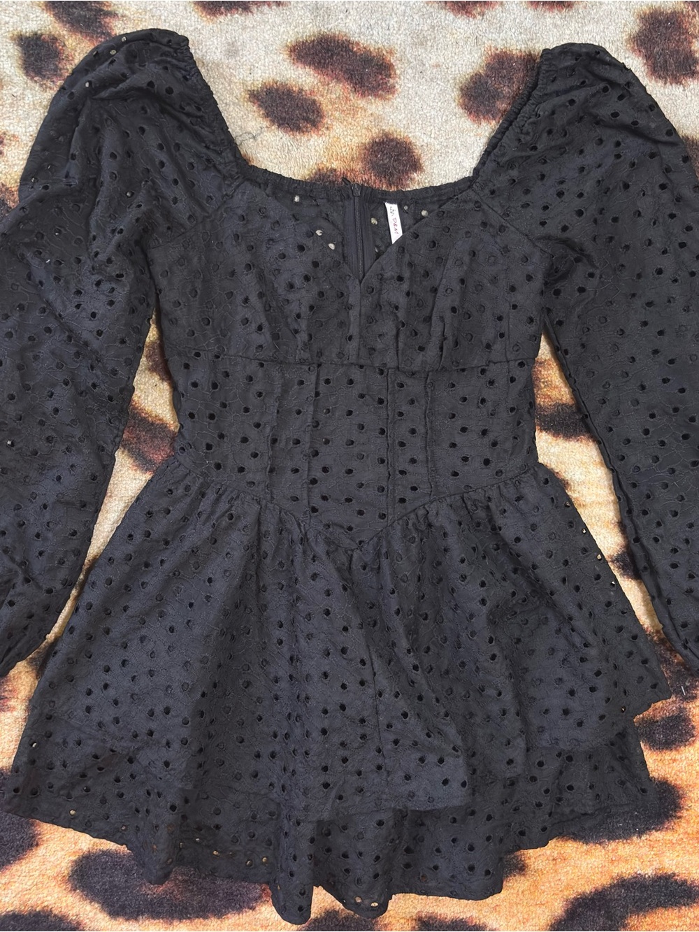 Black Swiss Dot Puff Sleeve Peplum Mini Romper Dress